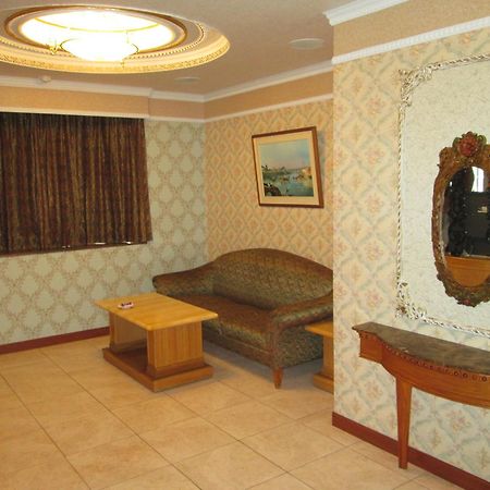 Huangjia Motel Тайнань Экстерьер фото