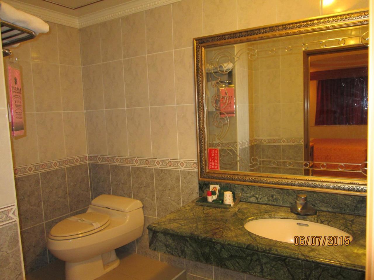 Huangjia Motel Тайнань Экстерьер фото